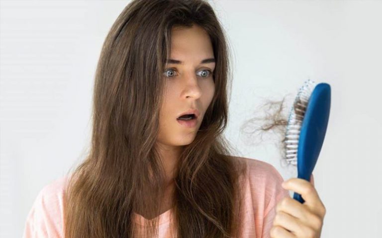 ریزش مو، علت و درمان آن