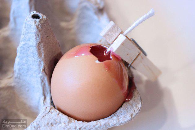 پر کردن پوسته‌ی تخم مرغ از موم